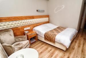 Postel nebo postele na pokoji v ubytování Serenti Pamuk Hotel + 25 fotografií