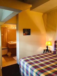 Letto o letti in una camera di Château Maucaillou