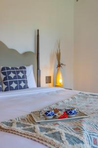 Letto o letti in una camera di Seclude Ramgarh Willows