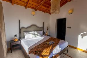 Letto o letti in una camera di Seclude Ramgarh Willows