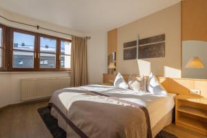 Postel nebo postele na pokoji v ubytování Hotel Central