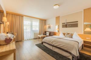 Łóżko lub łóżka w pokoju w obiekcie Hotel Central