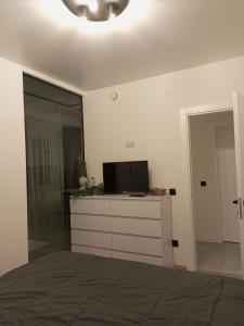 Televisyen dan/atau pusat hiburan di New loft style apartment +28 gambar