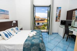 Voodi või voodid majutusasutuse Hotel Murmann toas