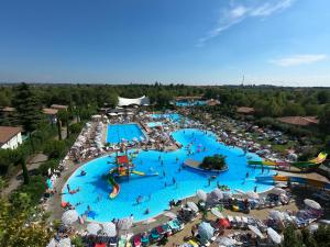 an overhead view of a water park with people in it at Hotel Bella Italia in Peschiera del Garda