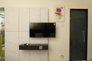 TV a/nebo společenská místnost v ubytování Hotel Florence