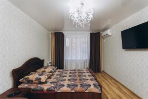 Ліжко або ліжка в номері LUXE Apartments Illinskaya 3 floor