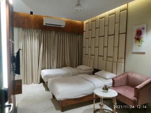 Postel nebo postele na pokoji v ubytování Hotel Florence