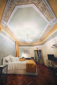 Säng eller sängar i ett rum på Residenza Palazzo Negri