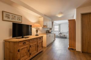 Telewizja i/lub zestaw kina domowego w obiekcie Hotel Central