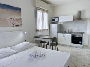 Кухня или кухненски бокс в Rimini Bay Suites&Residence