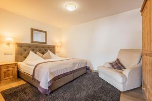 Łóżko lub łóżka w pokoju w obiekcie Hotel Central