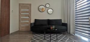 Posedenie v ubytovaní Apartament "Nad dachami"