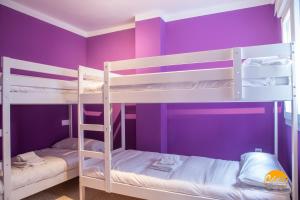 Posteľ alebo postele v izbe v ubytovaní Casa Arcoiris by Cadiz Time