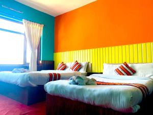 Tempat tidur dalam kamar di Mountain Resort