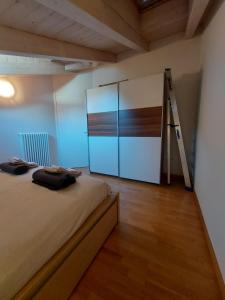 Postel nebo postele na pokoji v ubytování Appartamento Al Borgo