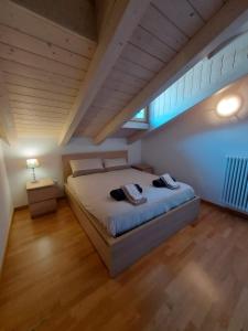 Postel nebo postele na pokoji v ubytování Appartamento Al Borgo