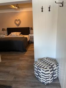 Postel nebo postele na pokoji v ubytování Friesen-Lodge Apartments