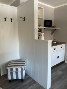 Kuchyň nebo kuchyňský kout v ubytování Friesen-Lodge Apartments