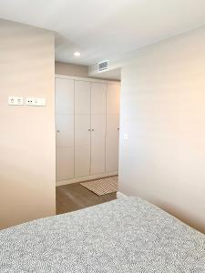 Ένα ή περισσότερα κρεβάτια σε δωμάτιο στο Appartement Duna beach 2 +23 φωτογραφίες