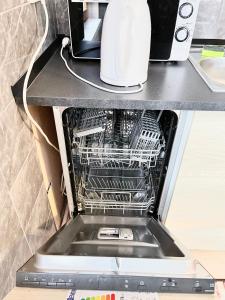 Kuchyňa alebo kuchynka v ubytovaní Apartmanovy dům Bublajda