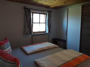 Postel nebo postele na pokoji v ubytování Ferienhaus Heuberger