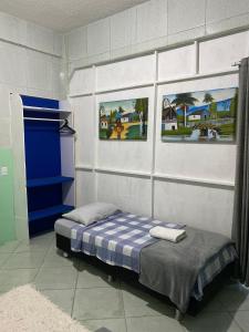 Een bed of bedden in een kamer bij Kitnet Praia do Trapiche