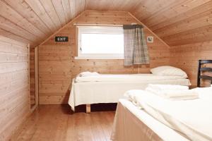 Postel nebo postele na pokoji v ubytování Topcamp Havblikk - Helgeland