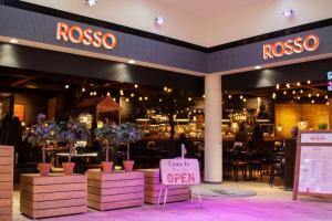 a restaurant with a sign that reads roosco at Original Sokos Hotel Lappee in Lappeenranta