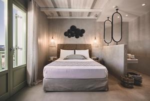 A bed or beds in a room at Noon Beyond Accommodation