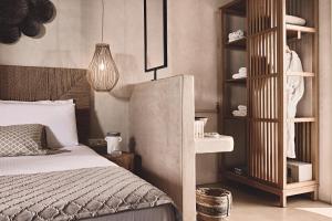 Posteľ alebo postele v izbe v ubytovaní Noon Beyond Accommodation