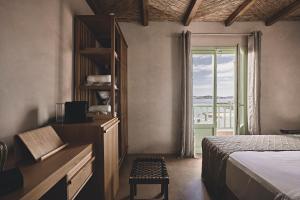 A bed or beds in a room at Noon Beyond Accommodation
