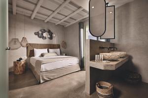 A bed or beds in a room at Noon Beyond Accommodation