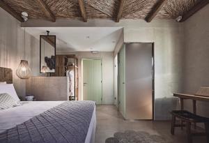 A bed or beds in a room at Noon Beyond Accommodation