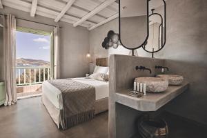 A bed or beds in a room at Noon Beyond Accommodation
