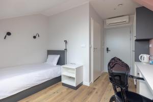 Posteľ alebo postele v izbe v ubytovaní ĄĘ Hostel Nowy Świat