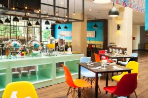 Restaurace v ubytování Idoop Hotel by Prasanthi