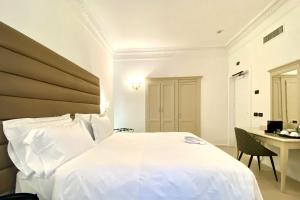 Postel nebo postele na pokoji v ubytování BB Hotels Smarthotel Bailey's