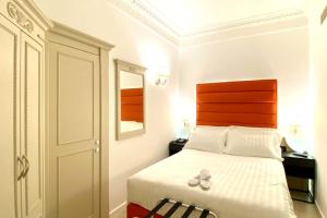 Postel nebo postele na pokoji v ubytování BB Hotels Smarthotel Bailey's