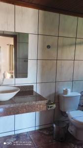 Kylpyhuone majoituspaikassa Pousada Recanto das Maritacas