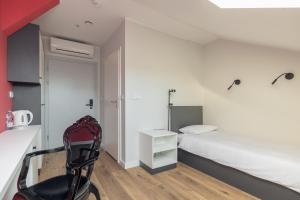 Posteľ alebo postele v izbe v ubytovaní ĄĘ Hostel Nowy Świat