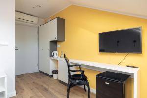 Kuchyňa alebo kuchynka v ubytovaní ĄĘ Hostel Nowy Świat