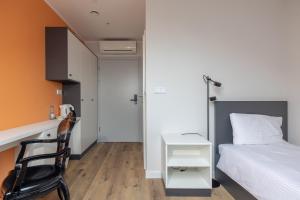Posteľ alebo postele v izbe v ubytovaní ĄĘ Hostel Nowy Świat