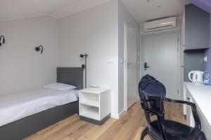 Posteľ alebo postele v izbe v ubytovaní ĄĘ Hostel Nowy Świat
