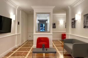 TV a/nebo společenská místnost v ubytování BB Hotels Smarthotel Bailey's