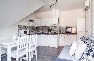 Kuchyň nebo kuchyňský kout v ubytování Levendula Apartman + 21 fotografií
