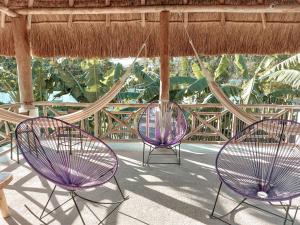 Balkón nebo terasa v ubytování Hotel Xa´an Bacalar