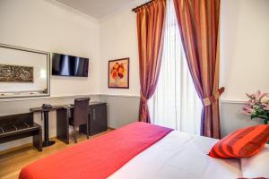 Кровать или кровати в номере Hotel Everest Inn Rome
