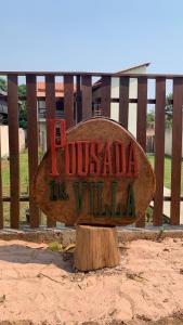 a wooden sign that reads roussada de villilla at Pousada da Villa in Sao Jorge
