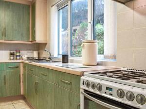 A kitchen or kitchenette at Nicosia House with sea views.